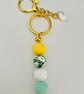Daisy flowers  and pastel toned  keyring  or purse charm 