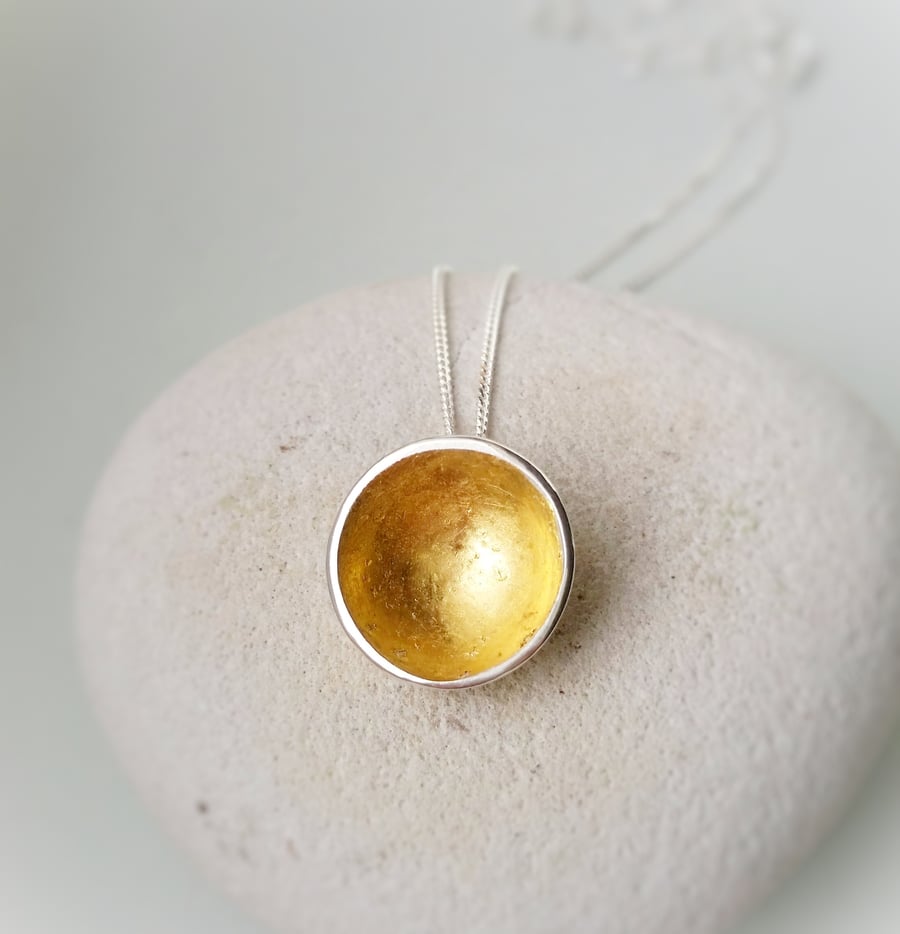 A simple minimal Gold lined disc necklace.  UK handmade