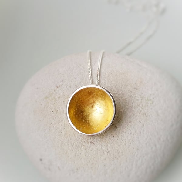 A simple minimal Gold lined disc necklace.  UK handmade
