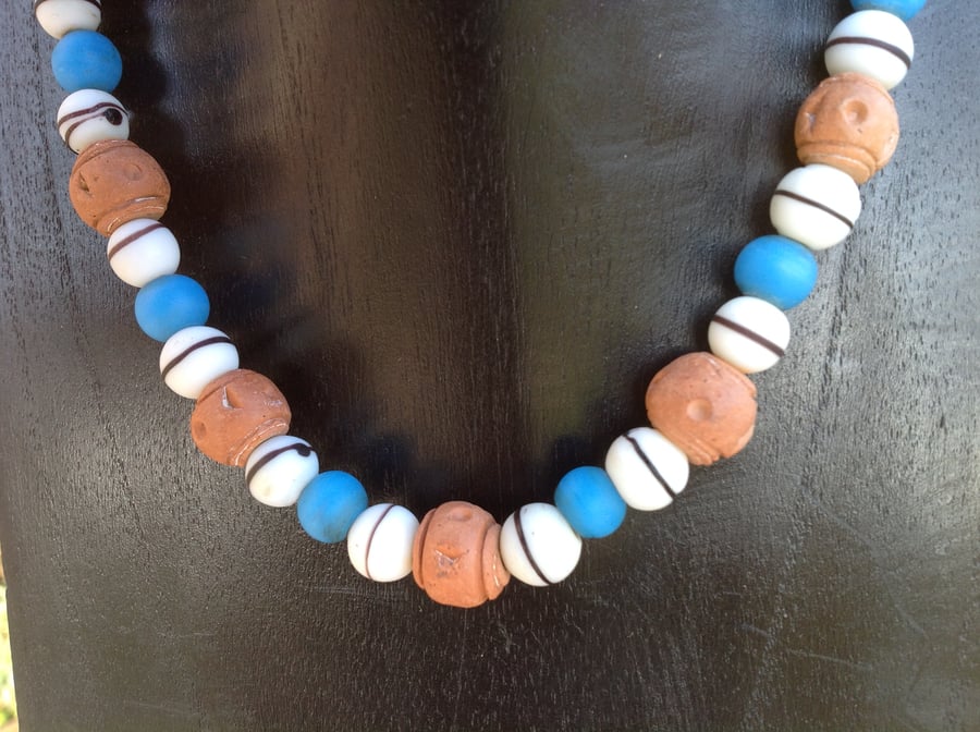 Unusual  African bead necklace with turquoise,white and terracotta beads