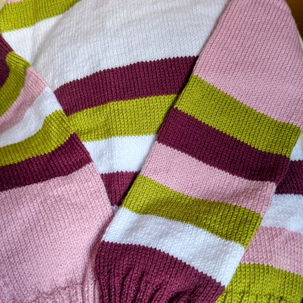 Girls 8 to 10 year old jumper in striped pattern in  various colours 