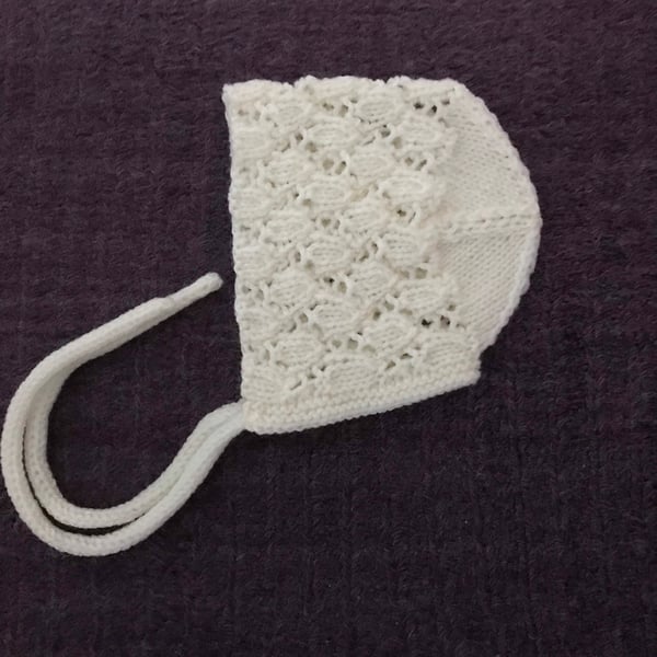 Cream lace baby bonnet, hand knitted