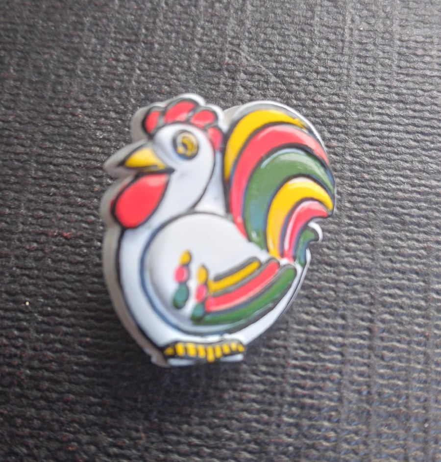 Buttons in the shape of a rainbow cockerel. 15mm. Pack of 6