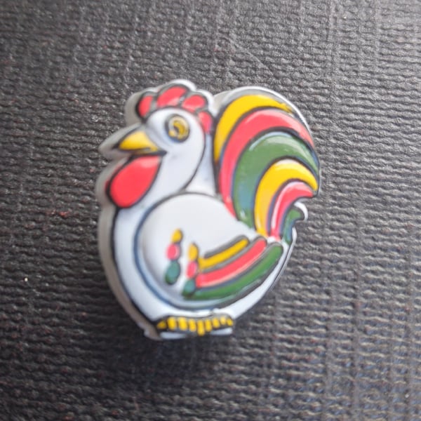 Buttons in the shape of a rainbow cockerel. 15mm. Pack of 6