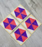Set of four quilted coasters with a traditional hexagon patchwork design. - Image 2