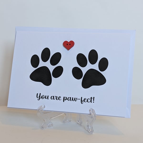 "You are paw-fect" with pawprints and a red heart button greetings card 