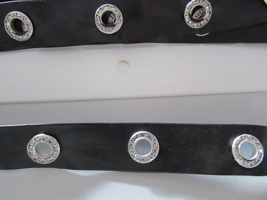 BLACK PLEATHER DIAMANTE EYELET TAPE SOLD BY THE METRE