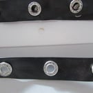 BLACK PLEATHER DIAMANTE EYELET TAPE SOLD BY THE METRE