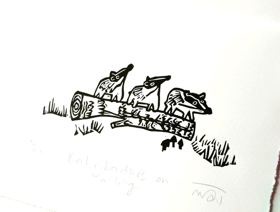 Baby Badgers on a log - lino cut print