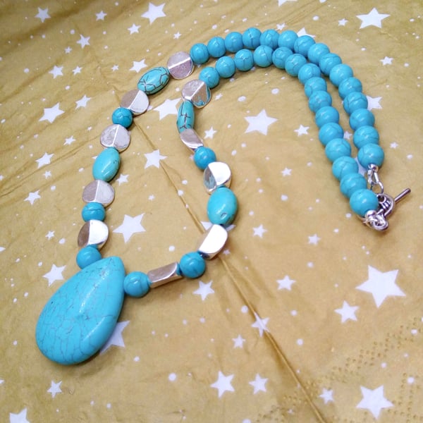 Turquoise Teardrop Pendant on an Turquoise and Silver Beaded Necklace