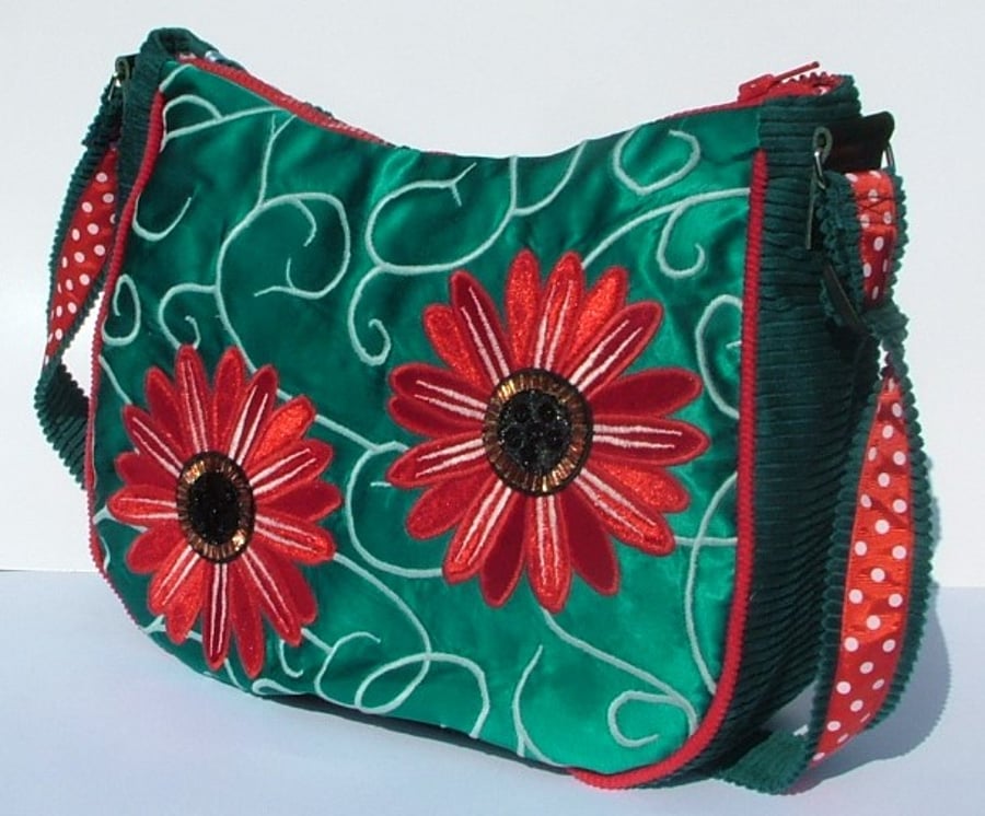 Turquoise satin Handbag with red flowers