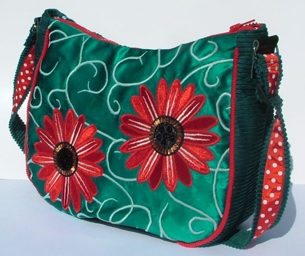 Turquoise satin Handbag with red flowers