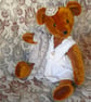 Collector's teddy bear 'born again' from antique and vintage materials. Matilda