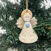 Teeny little ceramic angel Christmas angel blue heart