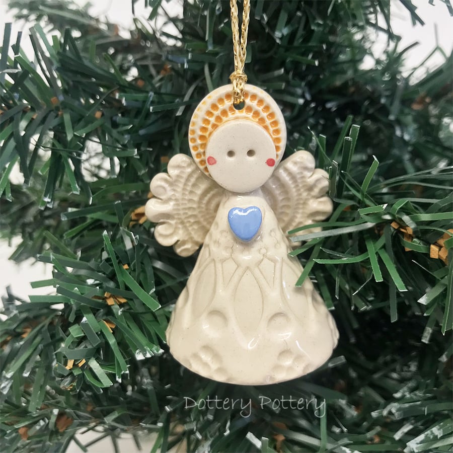 Teeny little ceramic angel Christmas angel blue heart