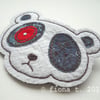 fabric brooch - zombie panda