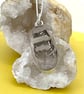 Finch feather pendant in silver