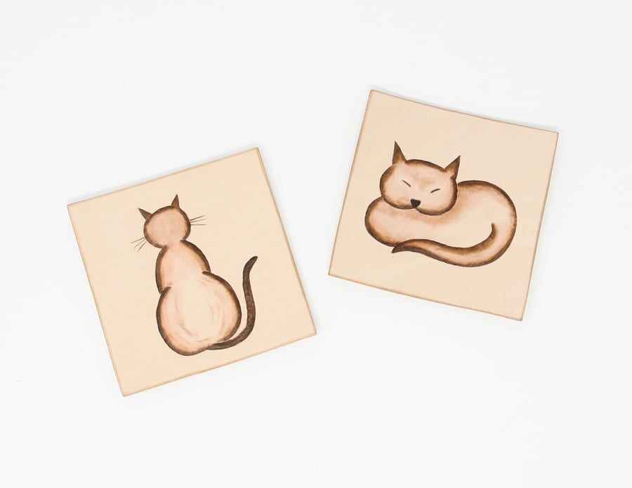 Pair of leather drinks coasters - with hand-painted cat motifs