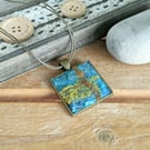 Felted square pendant - blue grey, hint of coral in a bronze bezel
