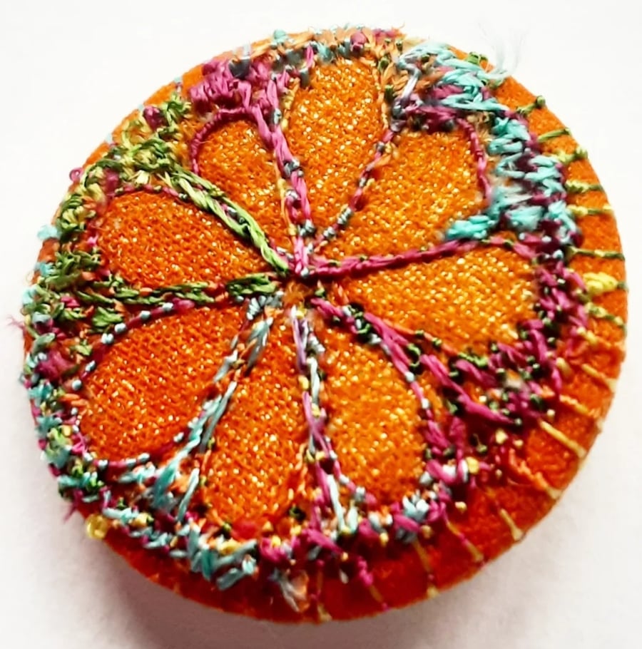 One Inch Badge Orange Flower 