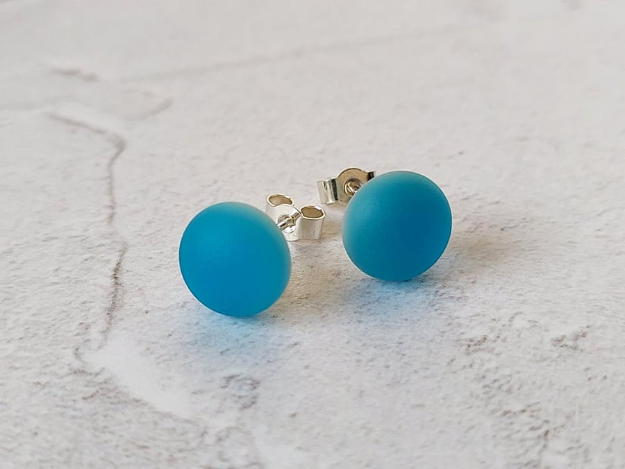 Turquoise glass stud earrings with sterling silver fittings