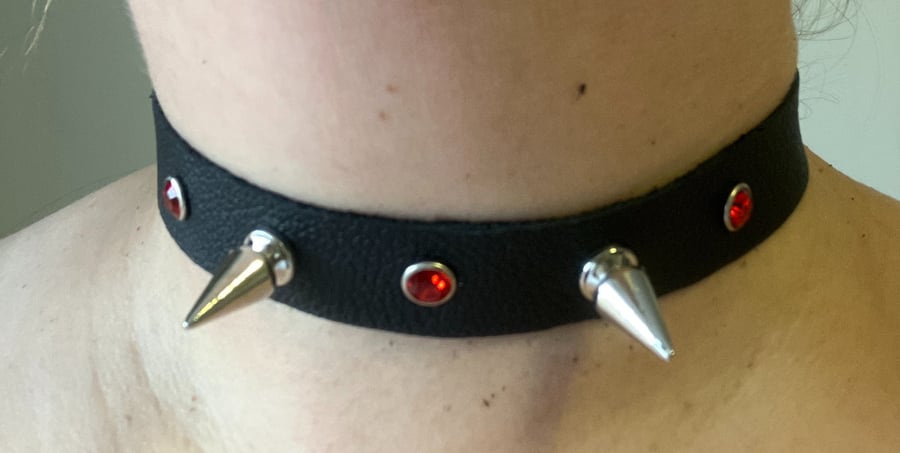 Black leather choker with 2 Spikes and 3 Red Gemstones