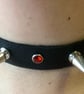 Black leather choker with 2 Spikes and 3 Red Gemstones