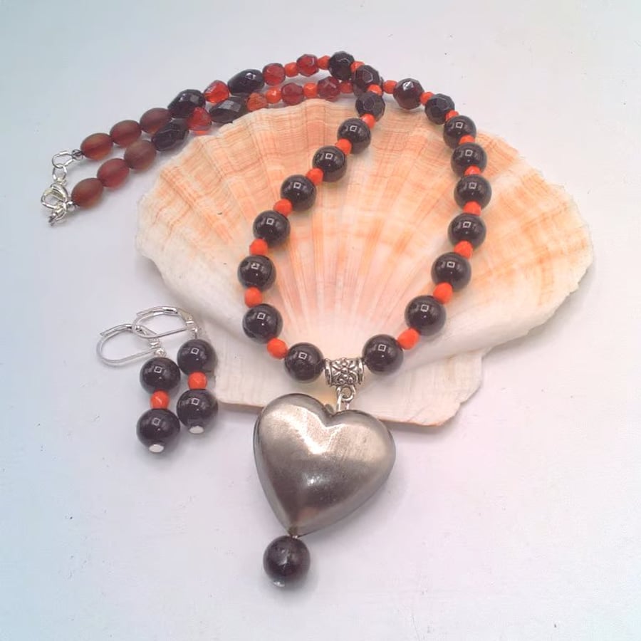 Necklace and Earrings Set with Red and Black Beads and a Brushed Metal Heart