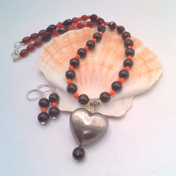 Necklace and Earrings Set with Red and Black Beads and a Brushed Metal Heart