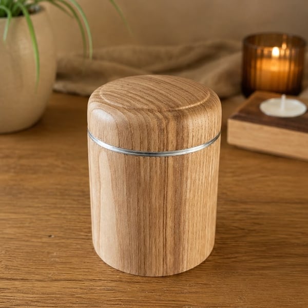 Handcrafted Ash pot with stainless steel threaded lid. 