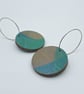 Round, wooden, hand printed hoop earrings in brown pink and blue-green - Image 1