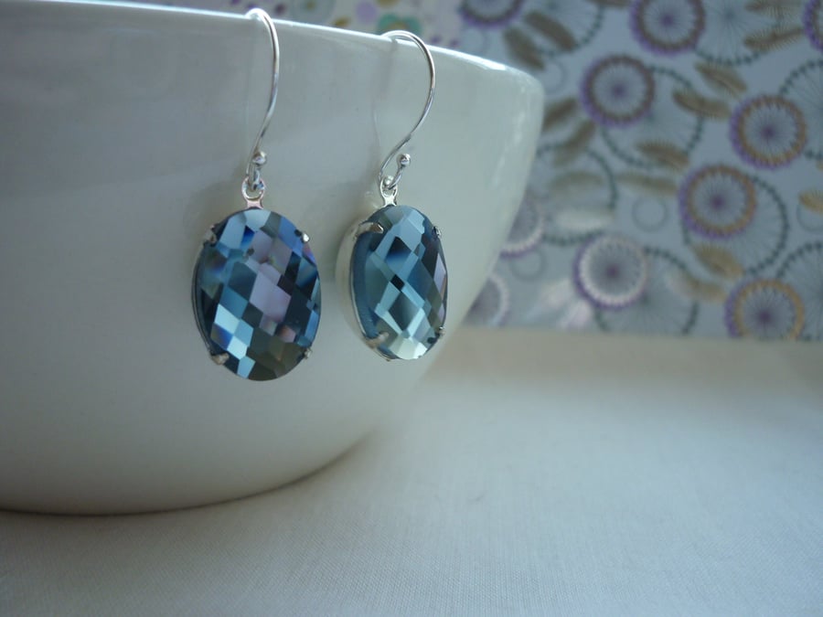 BLACK DIAMOND AND STERLING SILVER OVAL FACETED RHINESTONE EARRINGS.  934