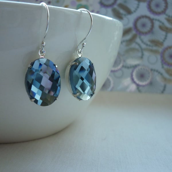 BLACK DIAMOND AND STERLING SILVER OVAL FACETED RHINESTONE EARRINGS.  934