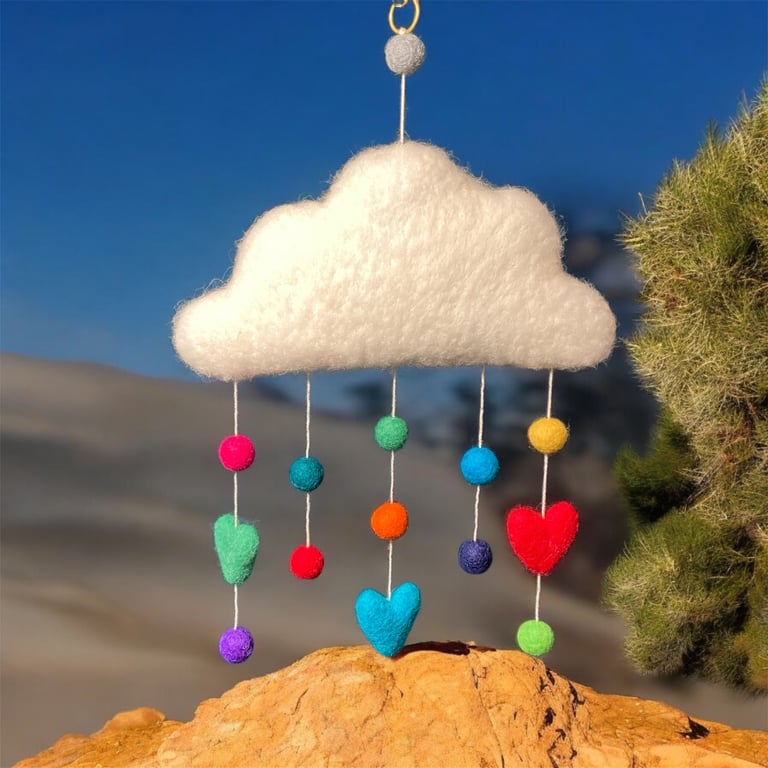 Felted cloud mobile with bright felt balls and hearts, nursery decoration