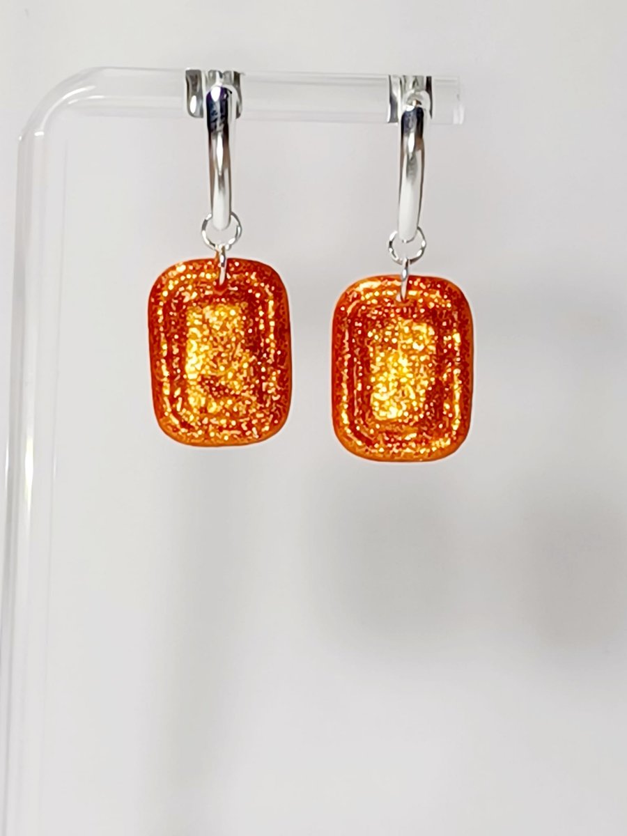 Orange sparkle fancy rectangle dangle earrings 