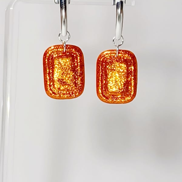 Orange sparkle fancy rectangle dangle earrings 