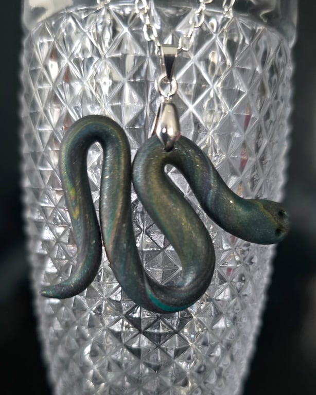 Polymer clay snake necklace on a silver plated chain