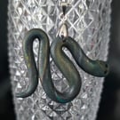 Polymer clay snake necklace on a silver plated chain