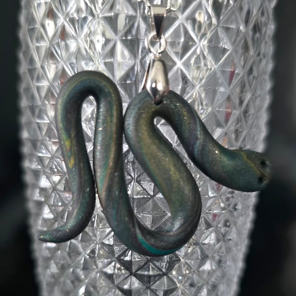 Polymer clay snake necklace on a silver plated chain