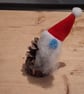 Pine Cone Christmas Gonk decoration with Blue Nose