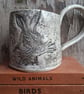 Ceramic handmade coffee mug large Hare black white green