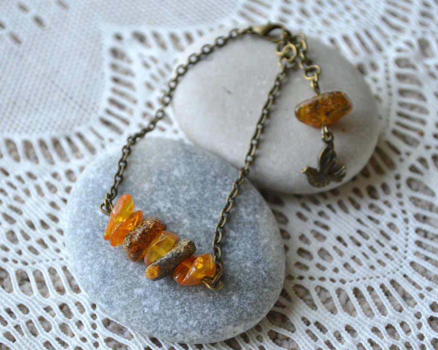 Amber Chip Bead Bracelet with Bird Charm