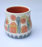 Ceramic hand thrown pot with unique orange and blue decoration - Image 6