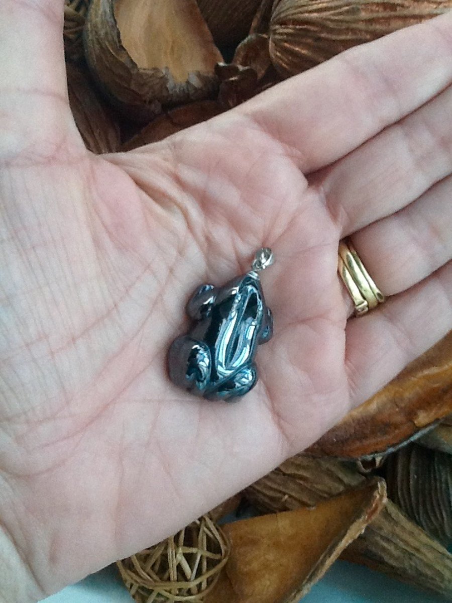 Resolution Hematite Carved Gemstone Frog Pendant on Silver Bail.