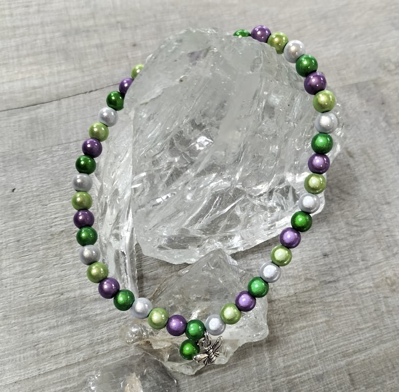 AL138A  Purple, greens and silver miracle bead elasticated anklet with bee