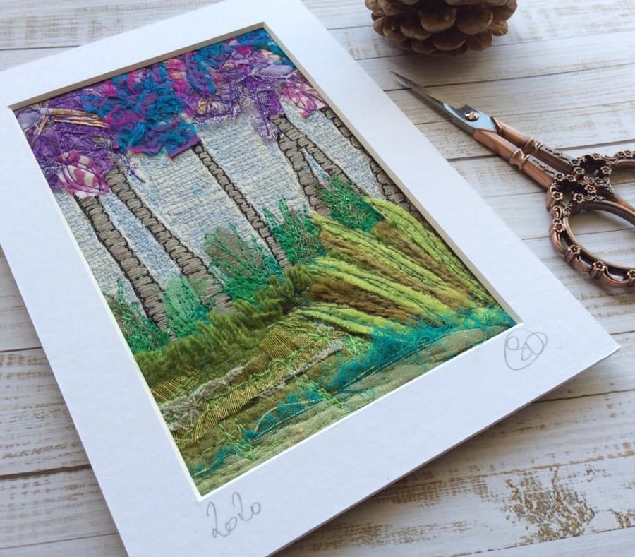 Embroidered up-cycled landscape.