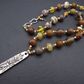 brown lampwork glass beaded necklace, pewter mandrake pendant