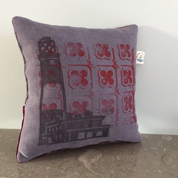 Purple lighthouse and red printed cushion with sleep sachet