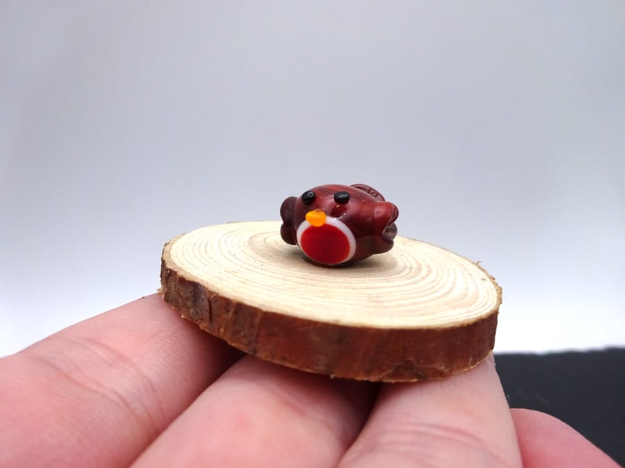 small glass robin