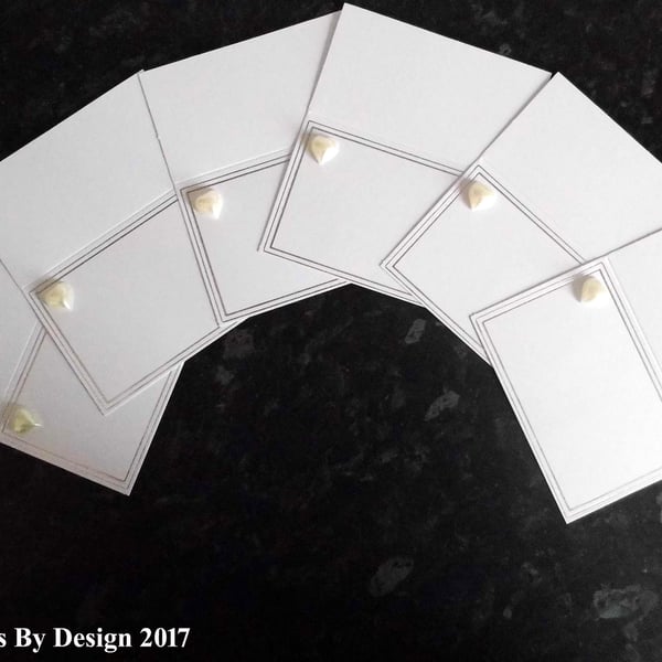 Six Silver & Pearl Place Card Settings